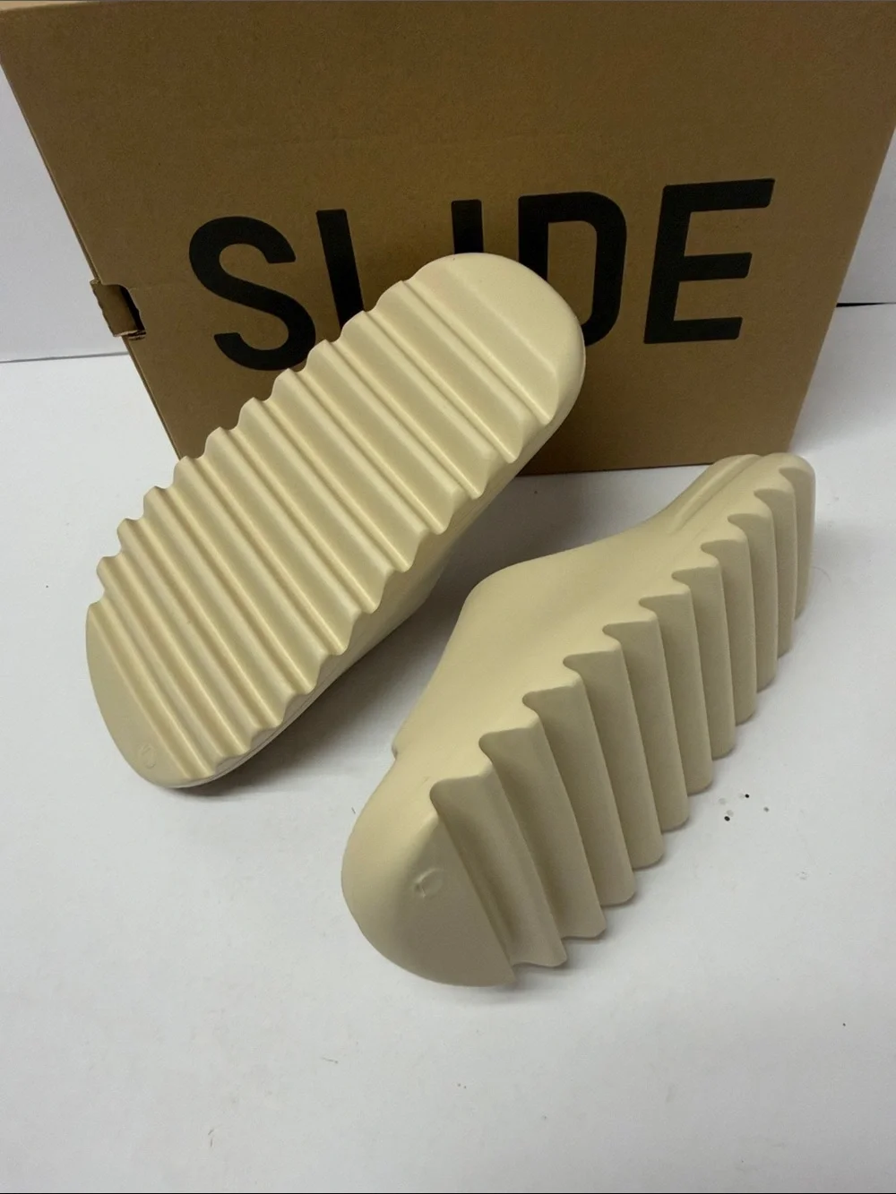 New men’s 11 Yeezy slides in cream BONE